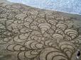 Художник з США створює величезні малюнки на піску (відео)