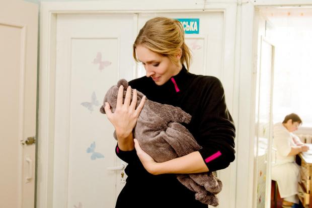 Катерина Осадча з новонародженою