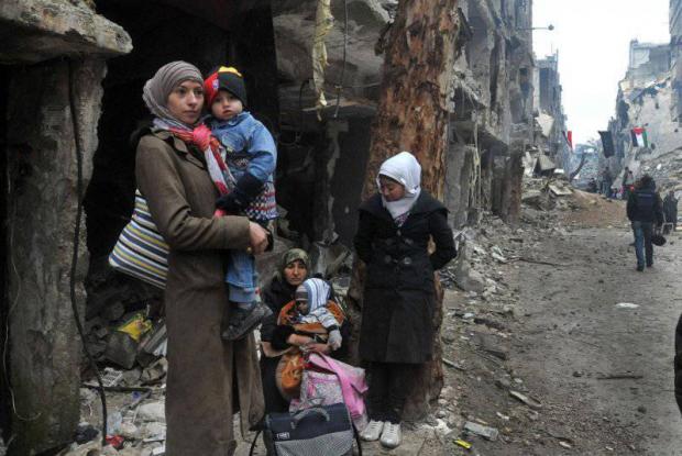 Біженці на околиці сирійської столиці Дамаск, лютий 2014 року